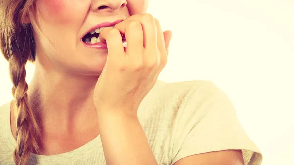 Scared, stressed woman biting her nails — Stock Photo, Image