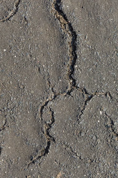 Grauer Lehm, Betonwand mit Rissen — Stockfoto