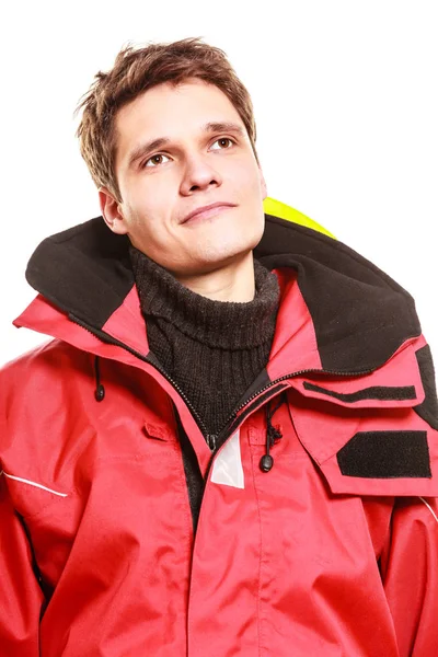 Young man in waterproof clothing.