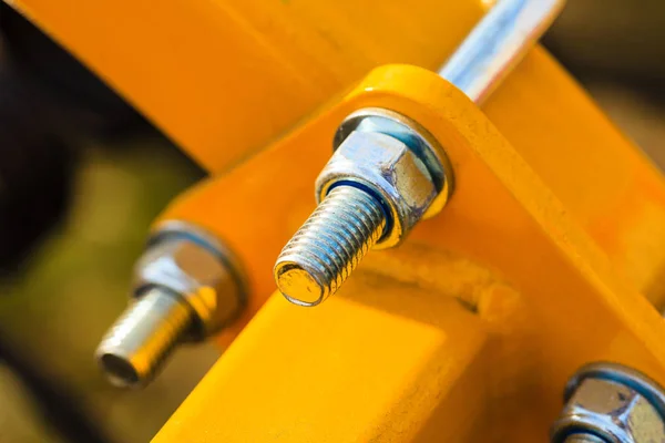 Detailed closeup of screw on indrustrial machinery — Stock Photo, Image