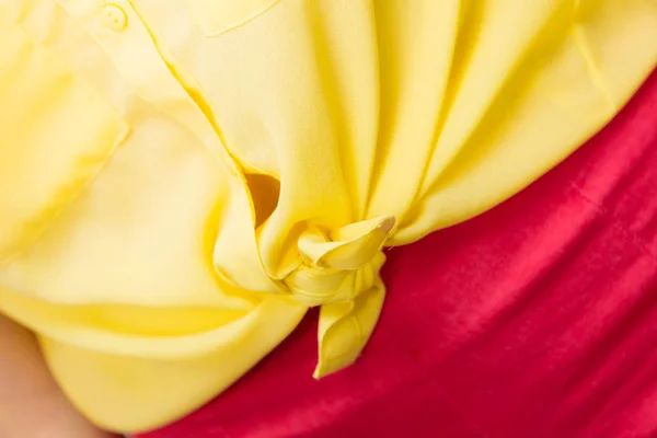 Woman in yellow knotted shirt closeup — Stock Photo, Image