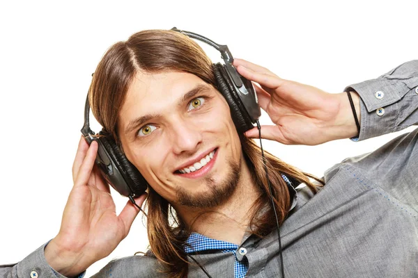 Hombre con auriculares escuchando música. Ocio . — Foto de Stock