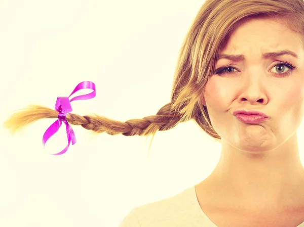 Teenage girl in braid hair making funny face — Stock Photo, Image