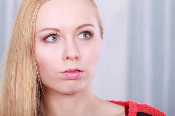 Portrait of blonde woman with serious face expression — Stock Photo, Image