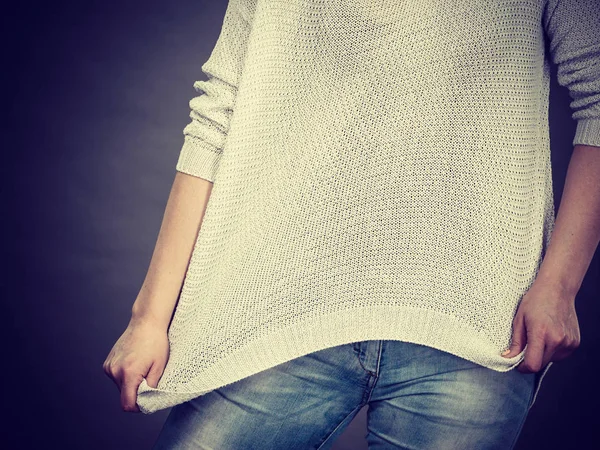 Unrecognizable woman wearing too big jumper — Stock Photo, Image