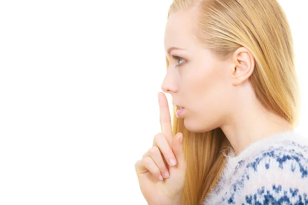 Young blonde woman making silence gesture — Stock Photo, Image
