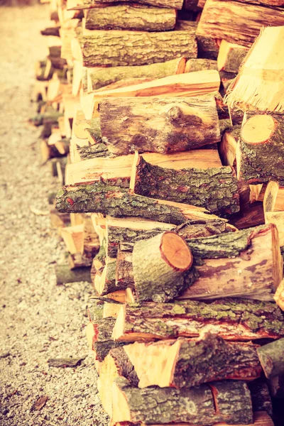 Firewood, pile of wood standing outside — Stock Photo, Image
