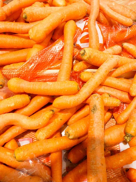 Primer plano, pila de muchas zanahorias naranjas — Foto de Stock