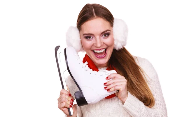 Smiling woman with ice skates — Stock Photo, Image