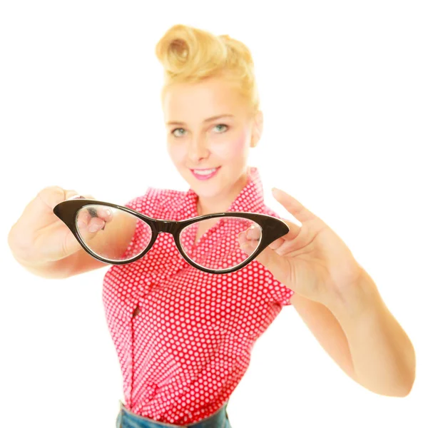 Blonde pin up girl holding retro glasses — Stock Photo, Image