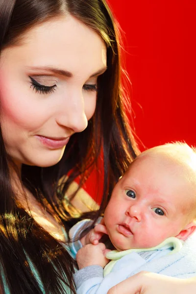 Mother holding her little newborn baby — Stock Photo, Image