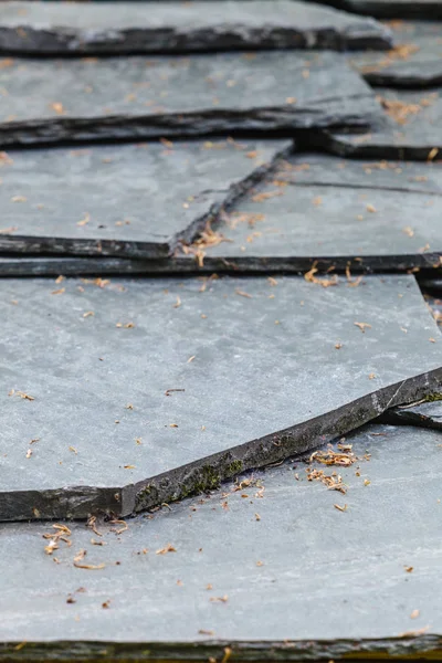 Closeup of dark grey stone roof tiles — Stock Photo, Image