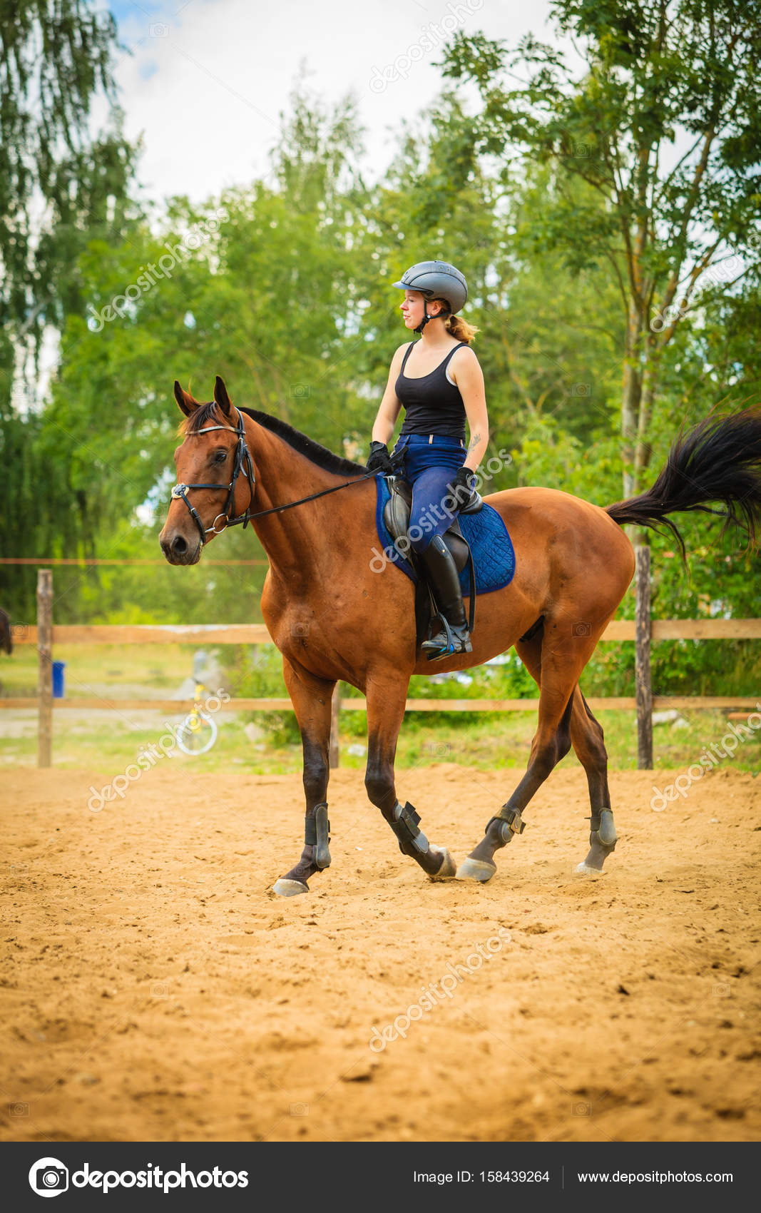Jockey girl doing horse riding on countryside meadow Stock Photo by ©Voyagerix 158439264 Jockey girl doing horse riding on countryside meadow Stock Photo by ©Voyagerix 158439264