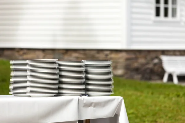 Big piles of fresh clean plates — Stock Photo, Image