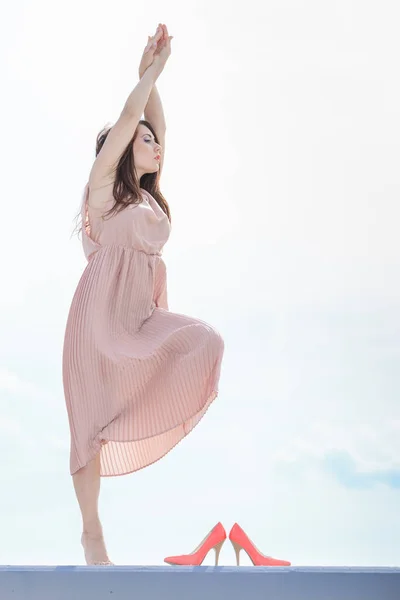 Woman in long dress elegant dress dancing — Stock Photo, Image