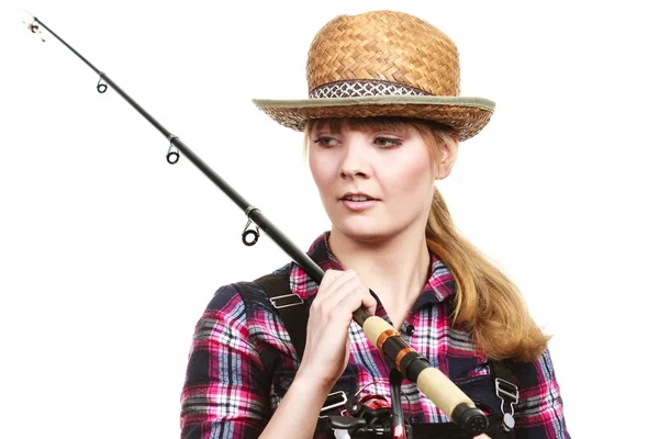 Mujer feliz en sombrero de sol sosteniendo caña de pescar —  Fotos de Stock