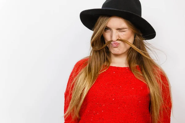 Silly lady playing with hairs. — Stock Photo, Image