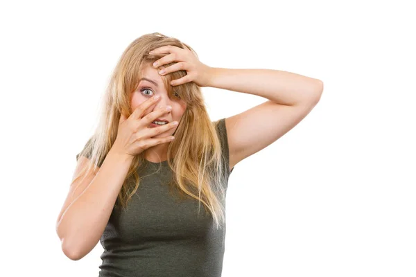 Ashamed embarrassed blonde woman with hands on face — Stock Photo, Image