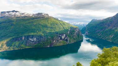 View on Geirangerfjord from Flydasjuvet viewpoint Norway clipart