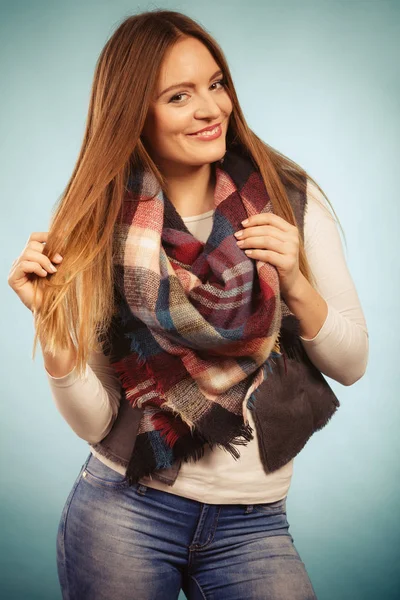 Woman wearing warm autumn clothing woolen checked scarf — Stock Photo, Image
