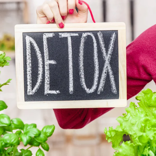 Woman having green diet vegetables, detox sign — Stock Photo, Image