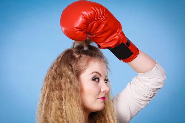 Cute girl in red gloves playing sports boxing — Stock Photo, Image