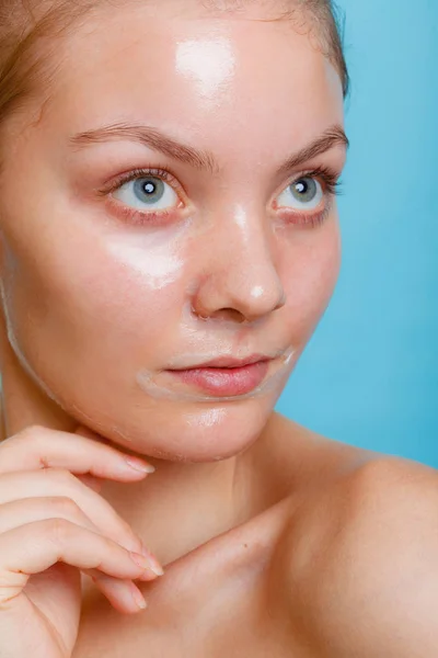 Woman in facial peel off mask. — Stock Photo, Image