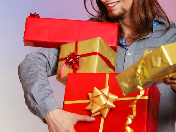 Male hands with many presents gift boxes — Stock Photo, Image