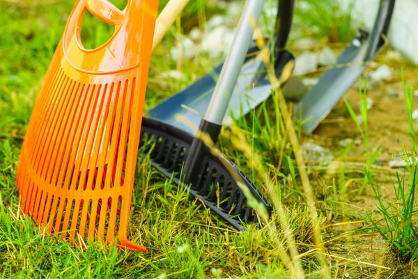 Gardening tools, rake, shovel and broom — Stock Photo, Image