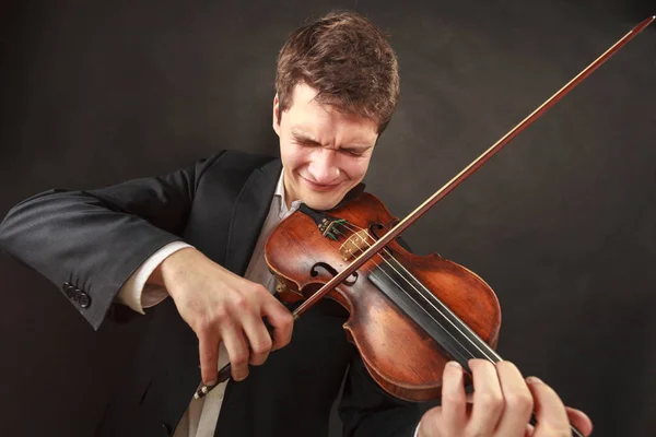 Man playing violin showing emotions and expressions — Stock Photo, Image