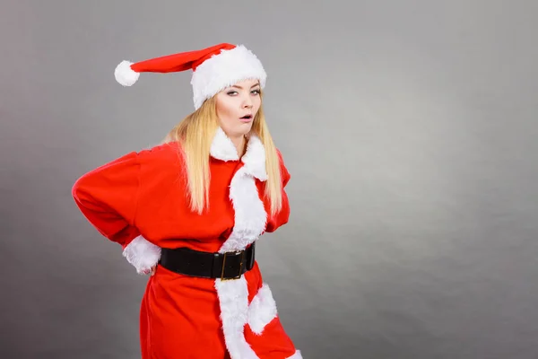 Dissatisfied woman wearing Santa Claus helper costume — Stock Photo, Image