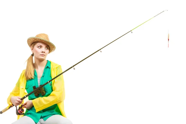 Kvinna med fiskespö, spinning utrustning — Stockfoto