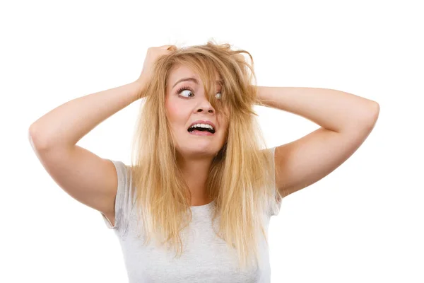 Crazy, mad blonde woman with messy hair — Stock Photo, Image