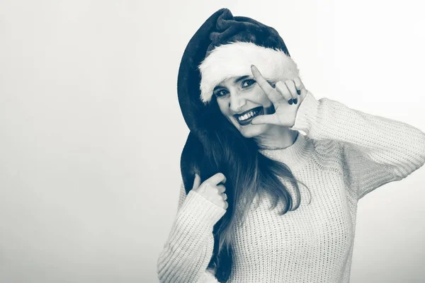 Christmas woman making frame with her hands — Stock Photo, Image