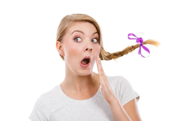 Teenage girl in braid hair making shocked face — Stock Photo, Image