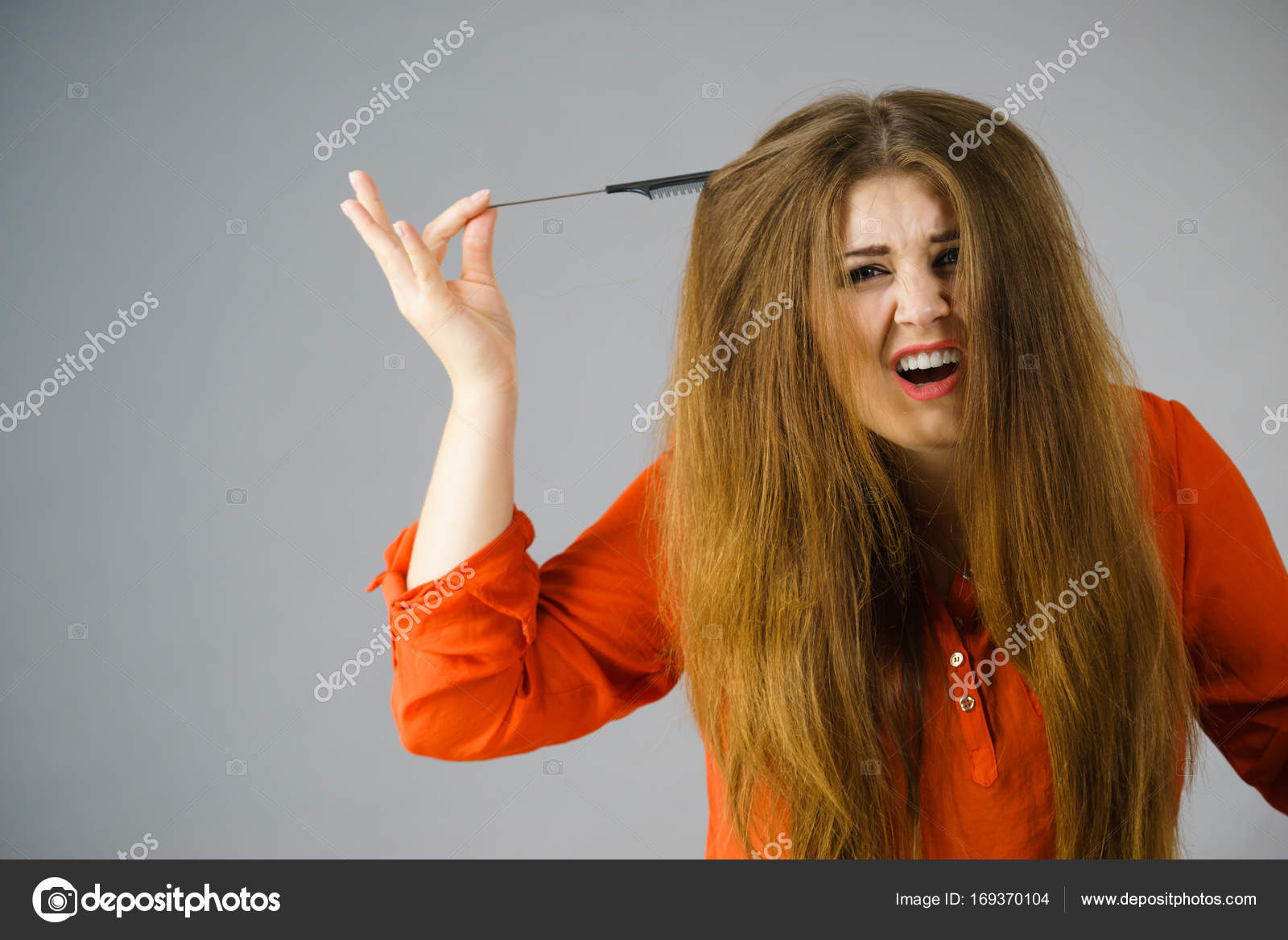 Woman Having Tangled Hair Stock Photo C Voyagerix 169370104