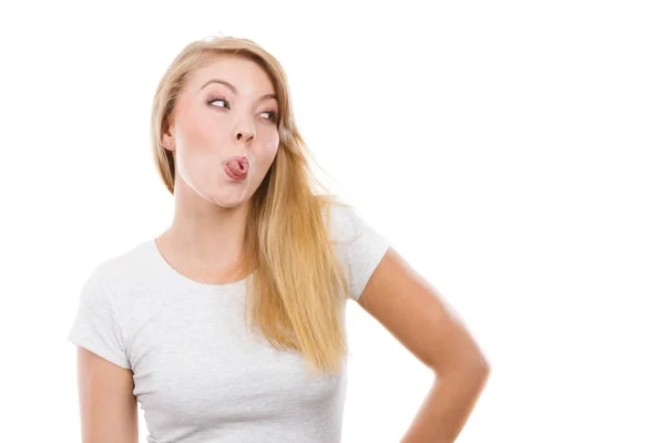 Funny blonde woman sitcking tongue out — Stock Photo, Image