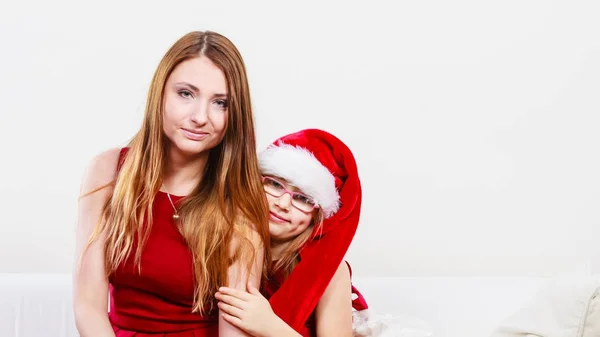 Mother and daughters in christmas outfit — Stock Photo, Image