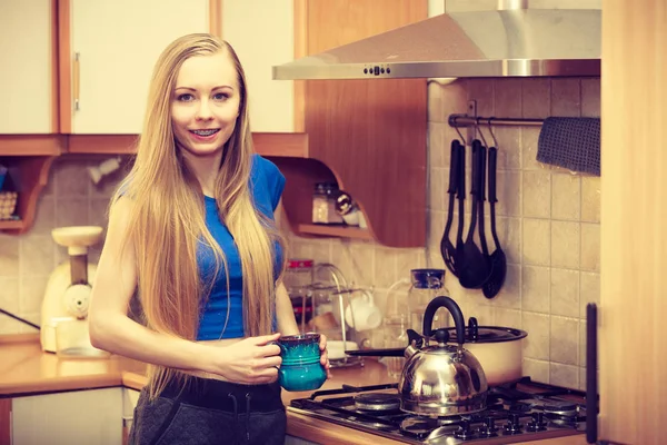 Woman holding cup of tea of coffee — Stock Photo, Image