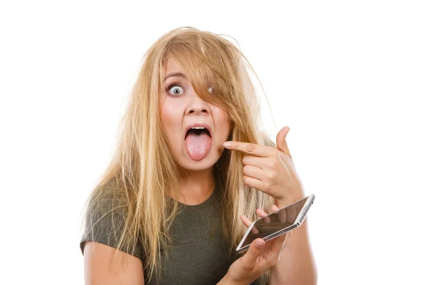 Crazy young woman talking on phone — Stock Photo, Image