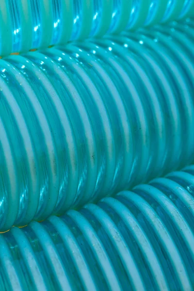 Detailed closeup of flexible plastic hose — Stock Photo, Image