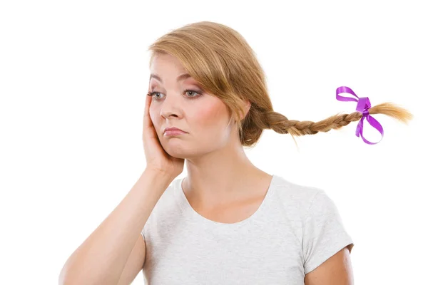 Sad teenage girl in windblown braid hair — Stock Photo, Image