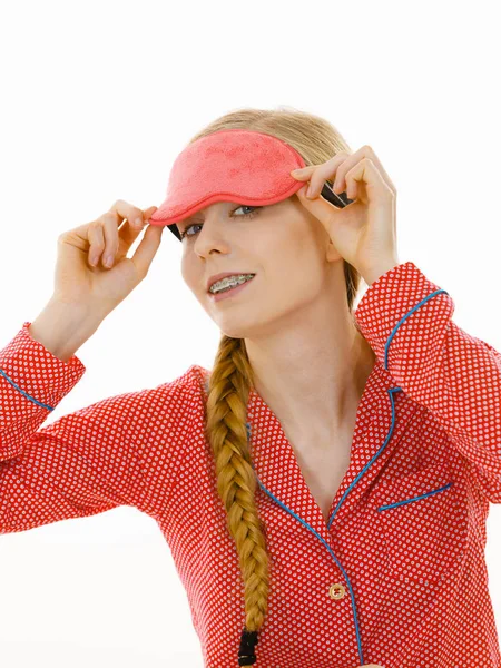 Sleepy woman wearing pink eye band — Stock Photo, Image