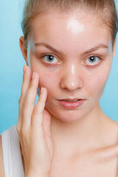 Woman in facial peel off mask. — Stock Photo, Image