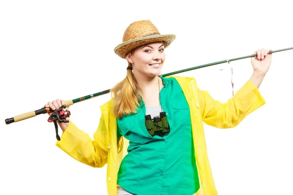 Kvinna med fiskespö, spinning utrustning — Stockfoto