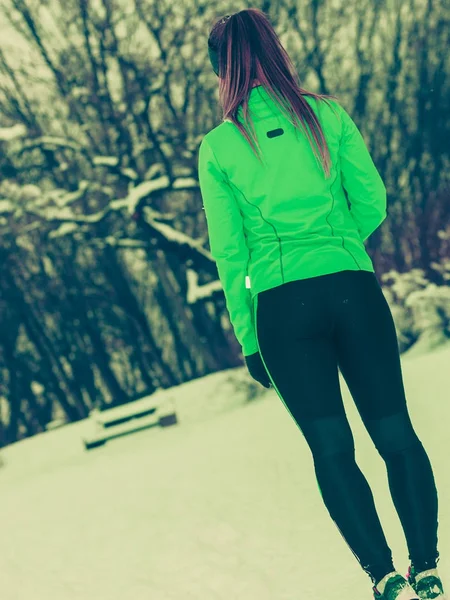 Woman fit sport model training outdoor on cold day — Stock Photo, Image