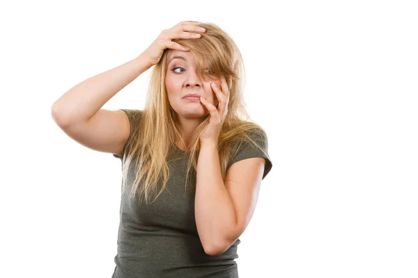 Ashamed embarrassed blonde woman with hands on face — Stock Photo, Image