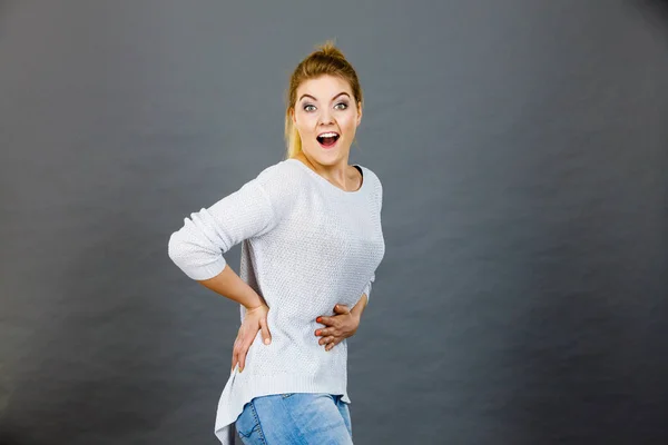 Mujer feliz tocándose el estómago y la espalda —  Fotos de Stock