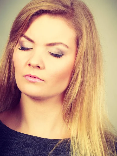 Closeup of woman thinking face expression — Stock Photo, Image