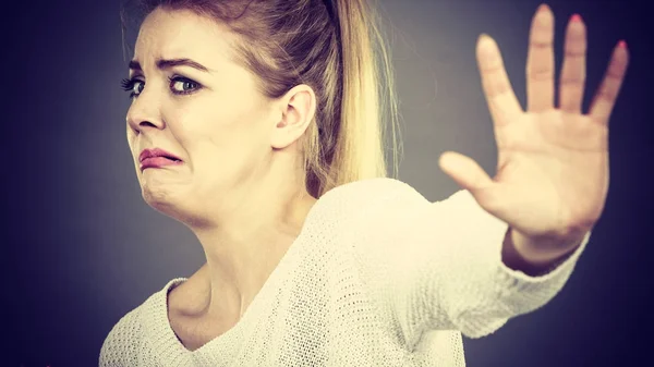 Scared woman gesturing stop gesture with hands — Stock Photo, Image